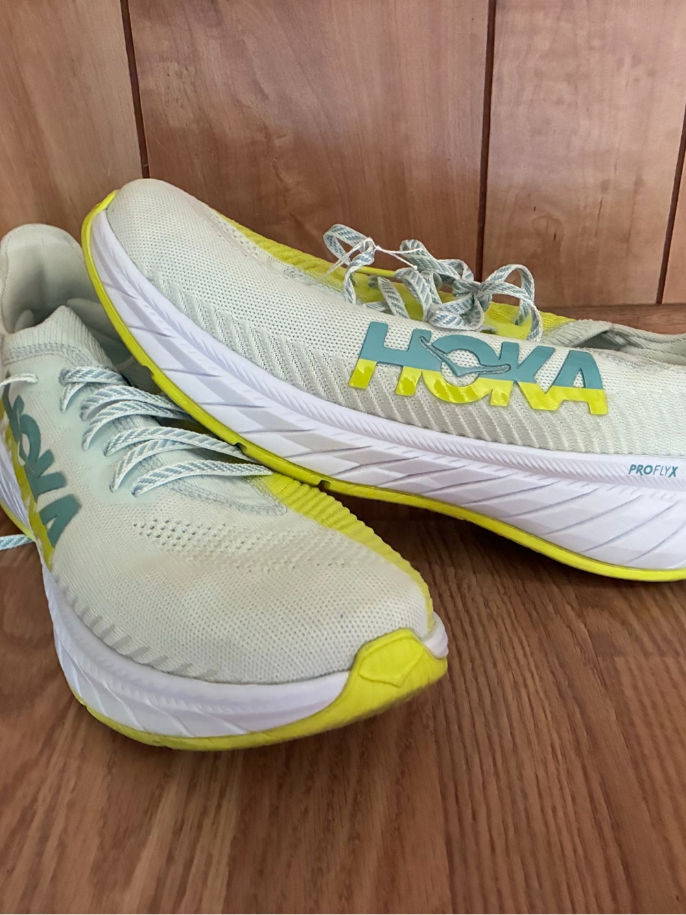 Hoka women’s White Running Shoes with Yellow Accents